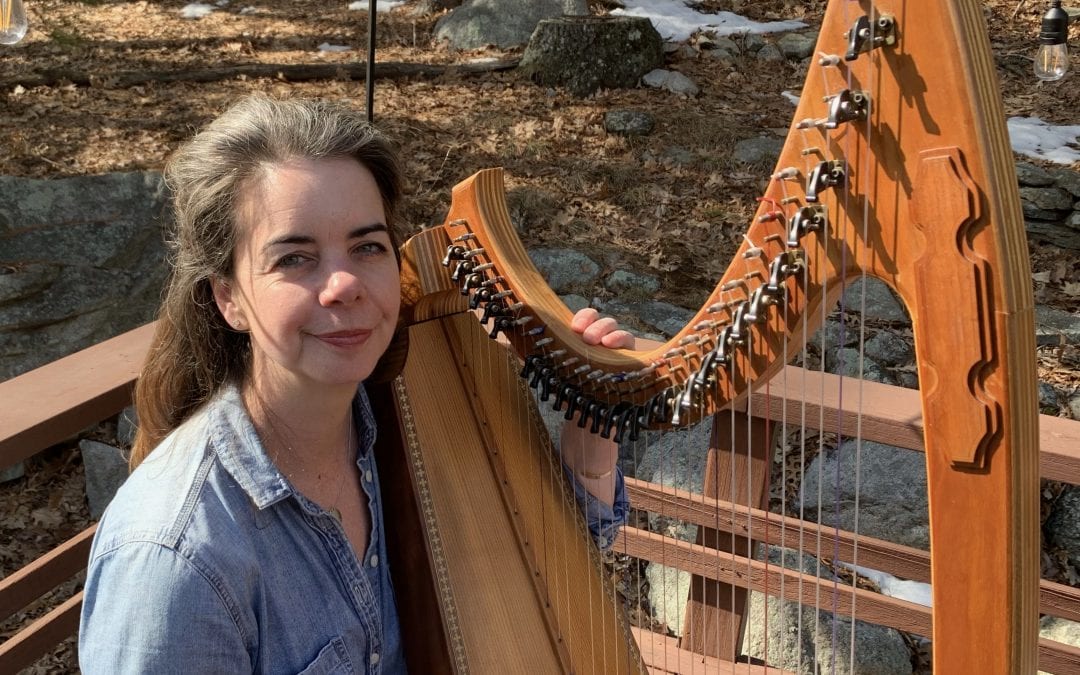 Jennifer Hollis and her harp